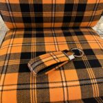Black and orange tartan +$150.00
